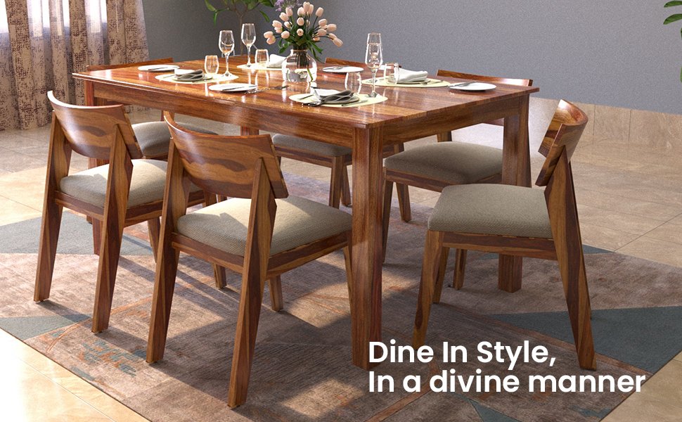 Modern Sheesham wood 6-seater dining table with cushioned chairs in a well-lit dining room